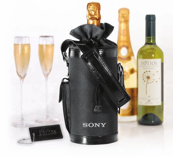 Adirondack Champagne and Wine Holder LG-9099 The perfect carrier for wine or champagne. Foam insulated microfiber and trimmed with top grain leather. Includes corkscrew.