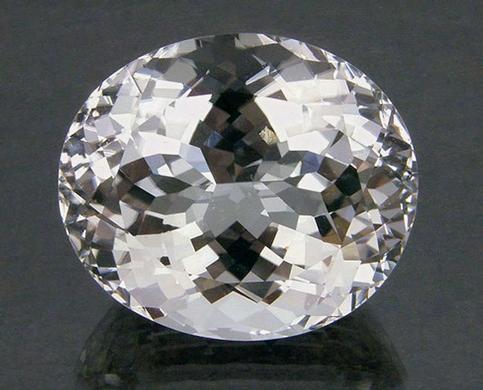 estimated would facet an eye-clean 200 ct gemstone. A literature search revealed only one reference to phenakite from Nigeria: J. Malley and A.