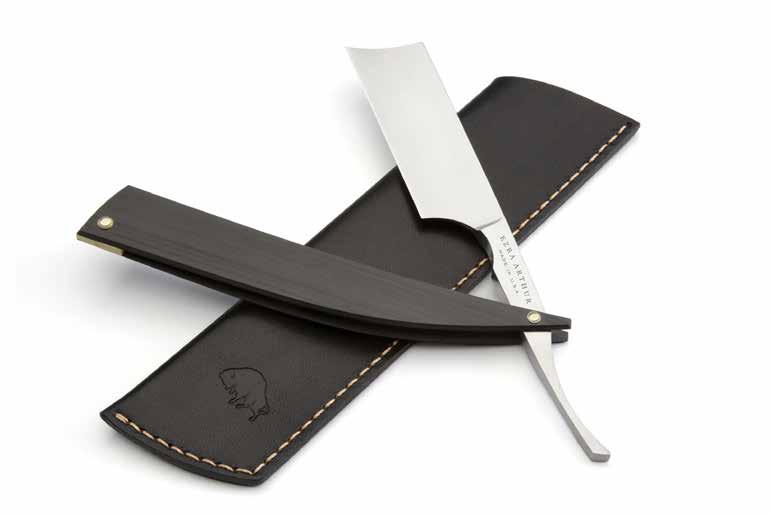This signature razor features a full-sized 8/8 blade, carbon fiber scales, faux ivory wedge and includes a sleeve made with Horween Chromexcel leather.