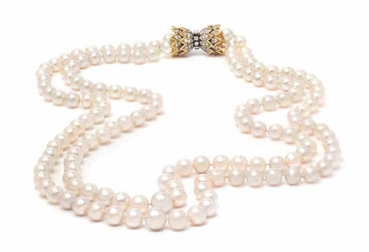 261 262 263 261 a double Strand Graduated cultured Pearl necklace with Bicolor Gold and diamond clasp, containing 138 graduated pearls measuring approximately 8.45-12.