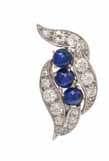 68 69 68 a Pair of art deco Platinum, Sapphire and diamond Earclips, containing six round cabochon cut sapphires weighing approximately 4.