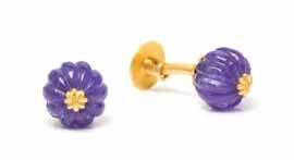 196 196 a Pair of 18 Karat Yellow Gold and tanzanite Cuffinks, consisting of two carved