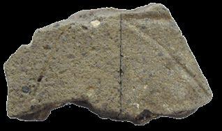 They include an eroded body sherd from a rounded medium sized jar with an appliqué cordon, and a string cut base (Figure 23.2 3).