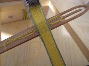 threads in a completely down or up position, with no shed to pass the weft thread through.