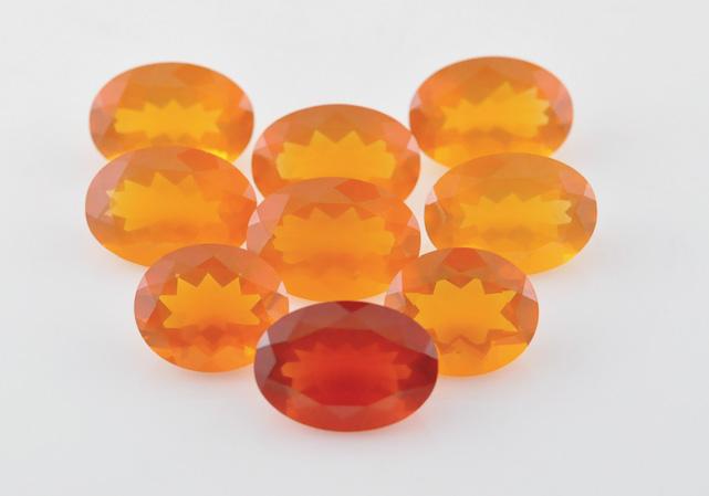 While the earlier material could be identified on the basis of low RI and SG values, the new synthetics have values that are quite similar to and partially overlap those of natural fire opals.