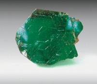 14 ct pear-shaped Carolina Emerald acquired by Tiffany & Co. in the 1970s. The result was a free-form step cut that weighed an impressive 74.66 ct, a new North American record. Figure 14.