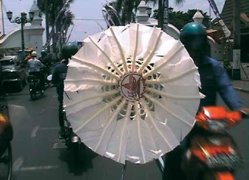 _Shuttle (from North to South), 2002 video, 13 30 min. A badminton shuttlecock is mounted in front of the lens of the camera.