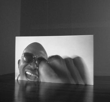_Mockery (Projections), 2002 featuring Atone Niane video installation, 15 20 min.