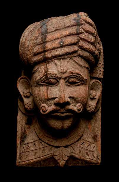 Indian Carved Wood Panel with Relief Head India. Ca. 19th to early 20th century.