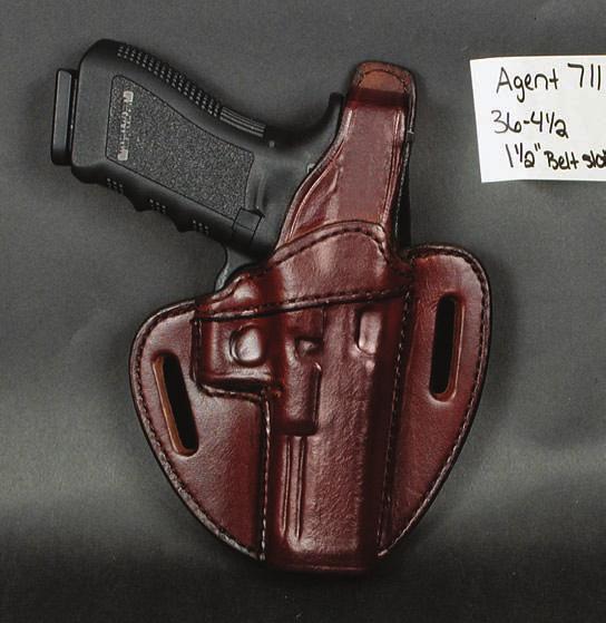 Agent 3 Slot This holster is made of heavy weight cowhide and features a metal reinforced thumb break with recessed snap and double