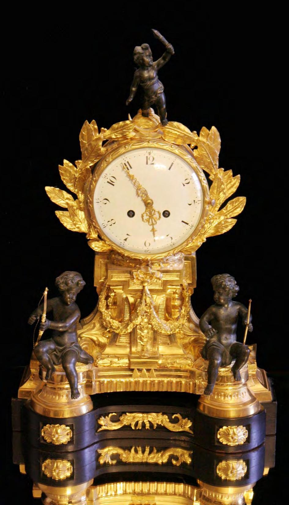 Direct From Paris, An Astounding Early 19th Century, "Napoleon III", Mantel Clock in Gold Plated Bronze and Bronze Patina with Solid Ebony
