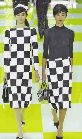 circles. The stripes Marc Jacobs created for his New York collection and the checks he mated for Louis Vuitton in Paris are out-ofthe-box, neo, neo, neo geos. Do the math!