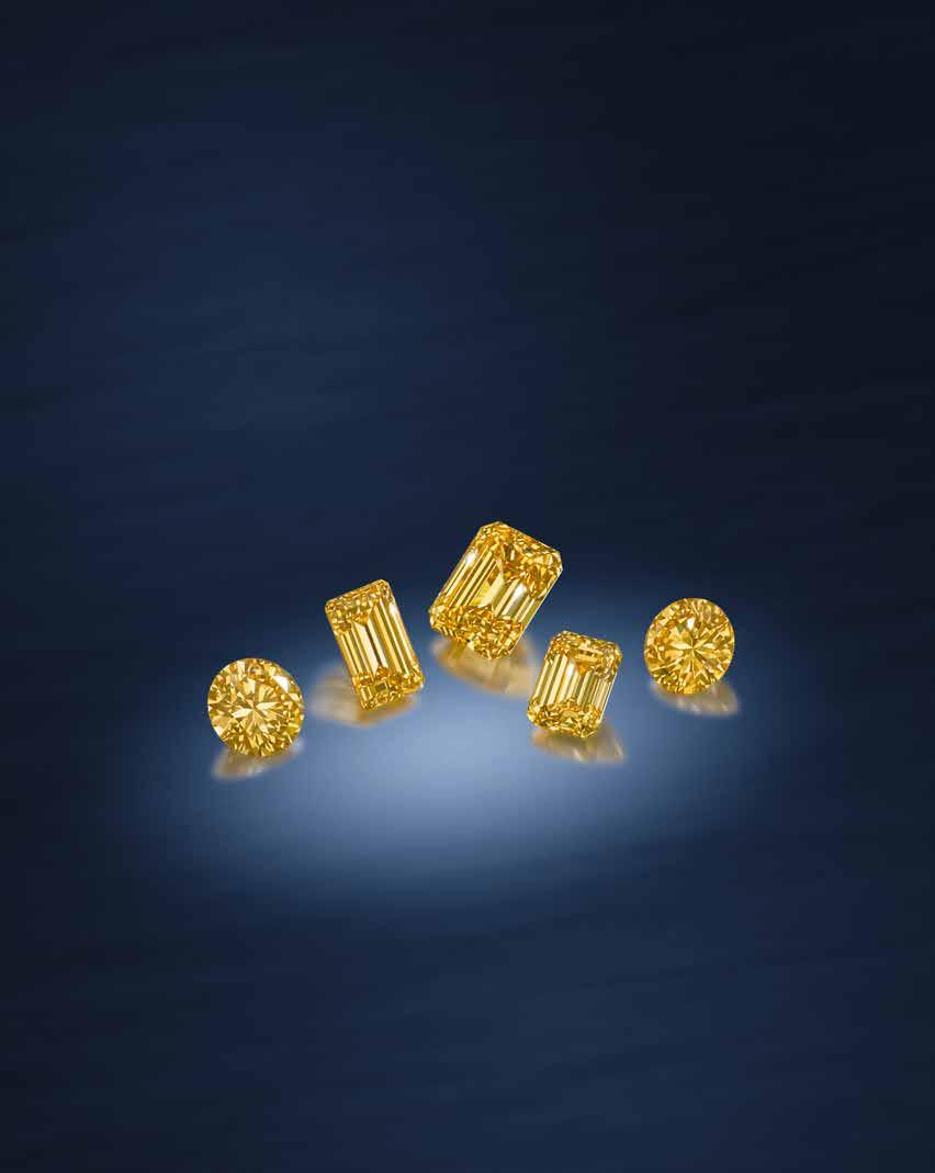 FINE JEWELLERY Thursday 7 December 2017 New Bond Street, London A PAIR OF BRILLIANT-CUT FANCY VIVID YELLOW DIAMONDS, WEIGHING 2.08 AND 1.