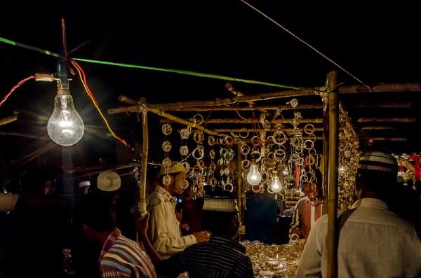Bulbs illuminating a bandi or kiosk at Night Bazaar