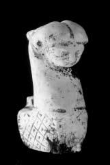Figure of snake with woman face.