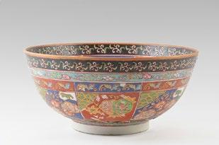5 1096 ASIE Large polychrome enamelled earthenware bowl decorated with various patterns such as fish in the centre. H: 16.5cm - 6.