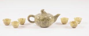 5 1156 TEA SET Natural stone tea set comprising a teapot and six