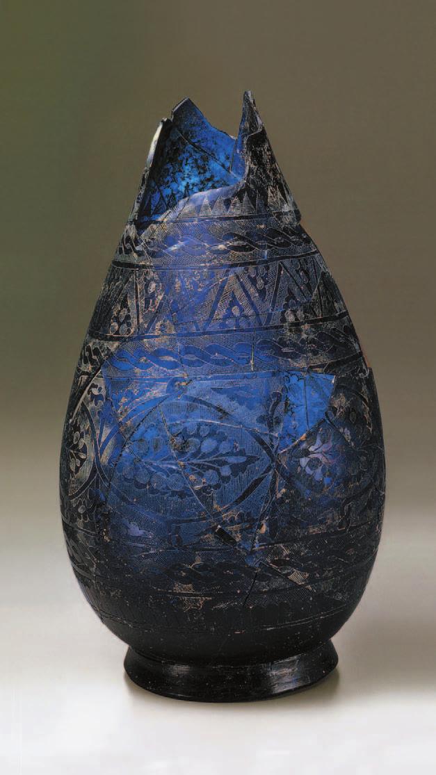 6 Fragmentary Bottle Syria or Iraq, 9th century Height 32.3 cm, maximum diameter 13.