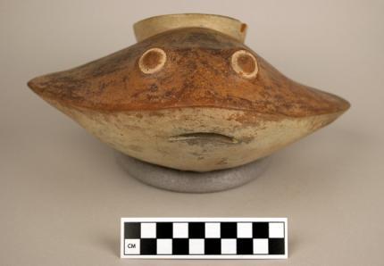 97 The Fish Monster (Figure 34) shows up on ceramic vessels in this study. The fish for which this creature is based has been difficult to identify.