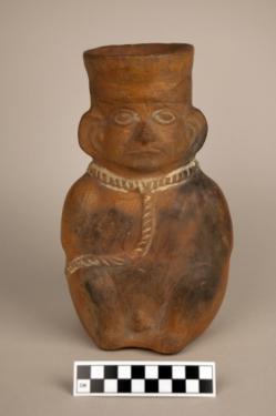 178 Art auction catalog from Monday, November 24, 1997 is described as a Mochica Prisoner Vessel.