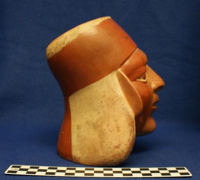 232 Catalog: 14912 / Accession: 3708 Catalog Information: Catalog Book #: 5 Date of Entry: July 1913 Name and Description: Effigy Pot = Red effigy pot, consisting of human head with head dress.
