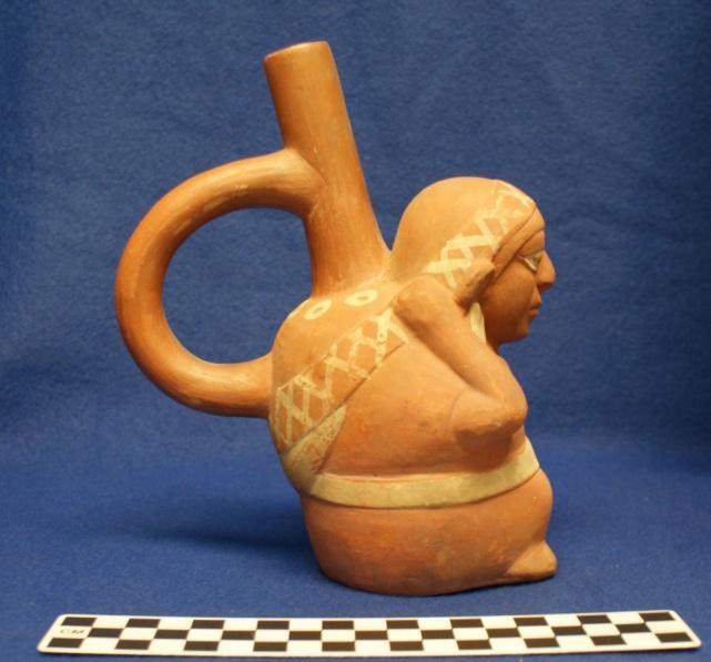 How Acquired: Purchase Remarks: Stamp Appraised 1968 B.A. Brown Author s Description: Red ware spout-and-handle bottle with cream-colored paint. Woman is carrying water and has earrings.