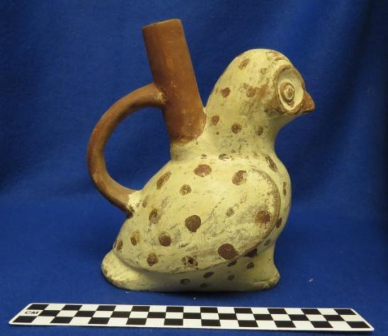 How Acquired: blank Remarks: Stamp Appraised 1968 B.A. Brown Author s Description: Red and cream-colored spout-and-handle bottle of owl with red spots. Measurements: Height of Body = 16.