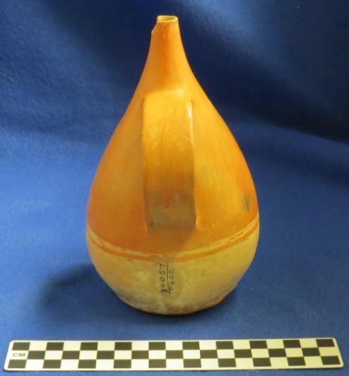 277 Catalog: 34057 / Accession: 9402 Catalog Information: Catalog Book #: 8 Date of Entry: February 15, 1929 Name and Description: Pot = Pinlay-red colored, pear shaped pot.