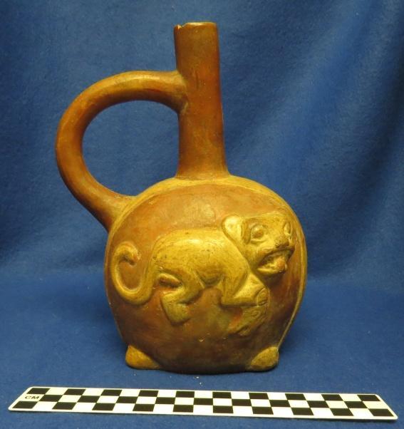281 Catalog: 52539 / Accession: 18148 Catalog Information: Catalog Book #: 12 Date of Entry: February 2, 1961 Name and Description: Mochica animal jugs pumas in relief arched handle and spout red and