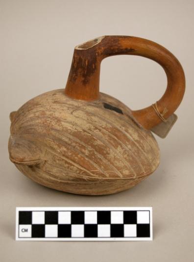 328 Catalog: 15976 / Accession: 26 Catalog Card/Inventory Information: Name = Siphonic Water Bottle (stirrup spout vessel) People = Peruvians (Moche as per Dan Shea 5/2002) Locality = Peru Country =