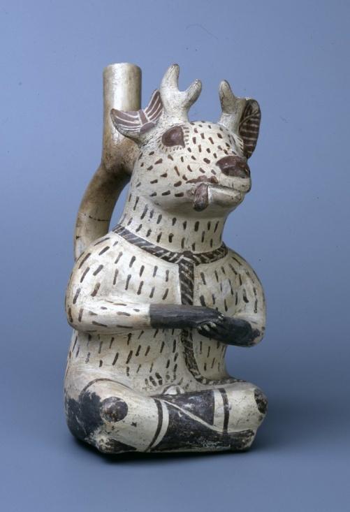 357 Object: Am1909,1218.59 Object type = vase Description = Vase (in form of seated deer; stirrup spout) made of pottery.