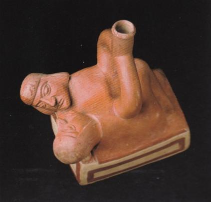 54 Figure 15: Moche erotic stirrup-spout bottle of a man and a woman under a blanket (Quilter 2010, 54).