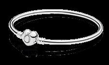 PANDORA bangles are fastened with ball or heart-shaped clasps.