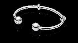 MOMENTS OPEN BANGLE Sterling silver The Moments Silver Open Bangle introduces an exciting new concept to the PANDORA jewellery universe, giving women even more choice and ways to style.