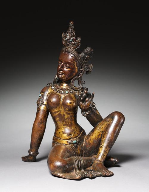 Title: Goddess Uma Date / Period: early 11th century Origin: Nepal Inv.N: 1982.49 Medium: Copper with traces of gilt and semiprecious stones Size: 35.6 x 27.9 x 25.4 cm Base: 2 x 29 x 29 cm Weight: 9.