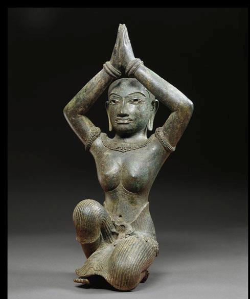 Title: Kneeling Woman Date / Period: Second half of the eleventh century Origin: Baphuon period Cambodia Inv.N: 1972.147 Medium: with silver inlay and traces of gold Size: Size: 43.2 x 19.