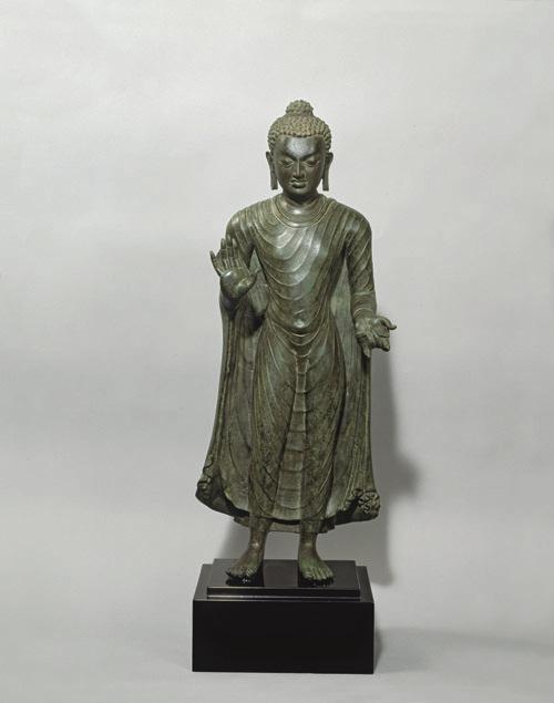 Title: Buddha Shakyamuni in Abhaya- Mudra Date / Period: Late sixth century Origin India, probably Bihar Inv.N: 1979.008 Medium: Size: 68.6 x 27.3 x 17.8 cm Base: 12 x 25.4 x 20.3 cm Weight: 26.