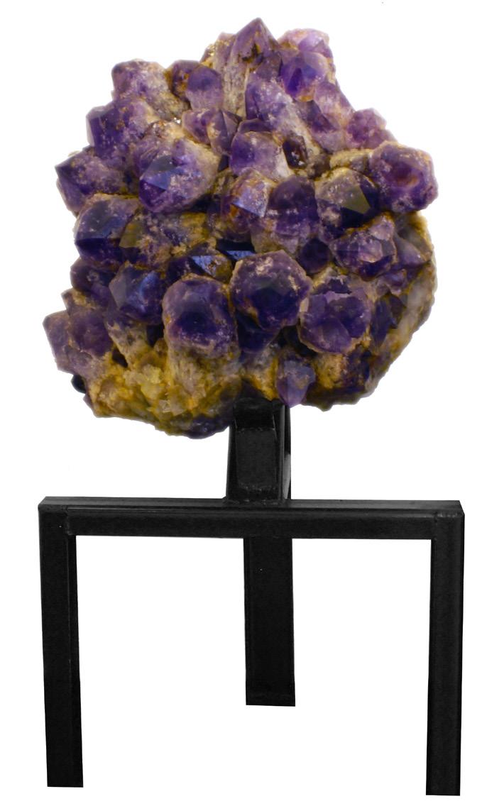 LARGE POINT AMETHYST CLUSTER This big-point ian amethyst cluster standing nearly 3 ½ feet tall, is a powerful piece for any space. This type of big-point formation has only recently become available.
