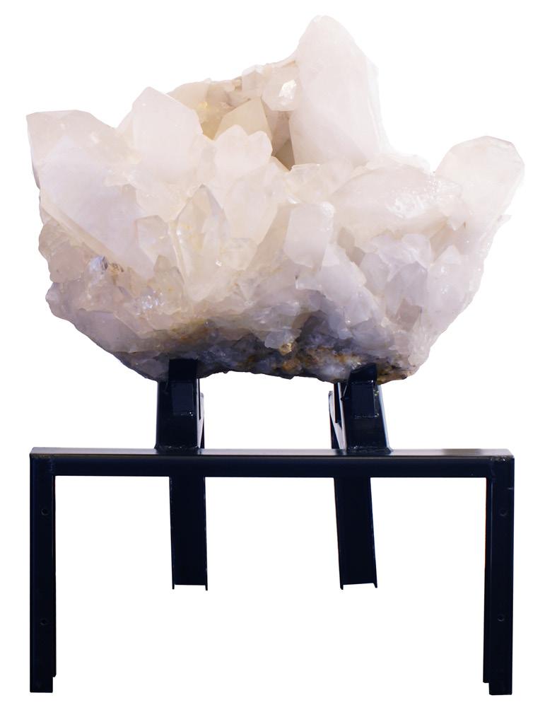 MULTI-POINT WHITE QUARTZ CLUSTER This large, multi-point white quartz ian cluster originates from the state of Minas Gerais. Crystal Quartz is considered a Universal Crystal because of many uses.