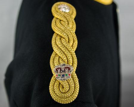 (screw base sewn into the uniform material).