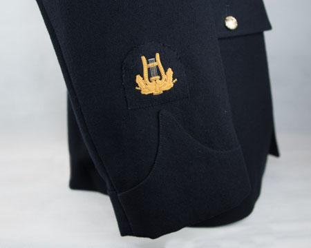 (gold on dark blue) Lower right arm - centrally, bottom edge of badge 10mm above point of sleeve slash 40D-24 June 2016 Version 6