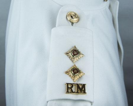star 5mm above RM (remaining star positioned 5mm above the first) WO1 badge: Embroidered Royal Arms (gold on dark blue) Lower right arm (attached by Velcro) - centrally, bottom edge