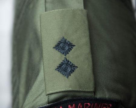 Lieutenant Colonel rank badge: Shoulder straps (rank slide) Crown (black on olive) Major rank