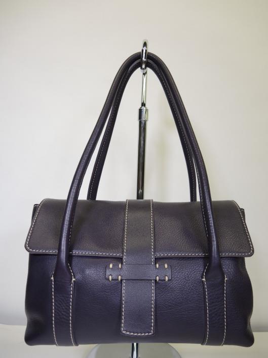 LORO PIANA Eggplant Dandy Satchel Retailed for $1,690, sold in one day for $699. 09/30/17 Luxurious and sophisticated Loro Piana always creates purses out of the softest, leathers.