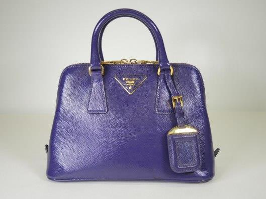 PRADA Purple Saffiano Patent Leather Small Promenade Purse Retails for $1,780, sold in one day for $549. 09/23/17 Striking in its color and construction, this little bag has big style.