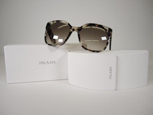 PRADA Translucent Grey and Brown Tortoise Shell Sunglasses Sold in one day for $149.