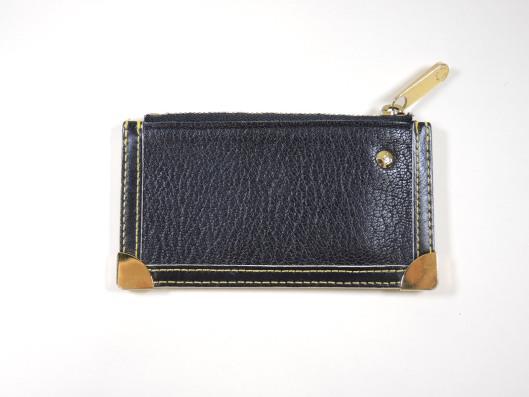 LOUIS VUITTON 2003 Black Leather Key and Card Holder Sold in one day for $99. 08/12/17 This tiny black pebbled leather pouch is just the right size for credit cards and keys.