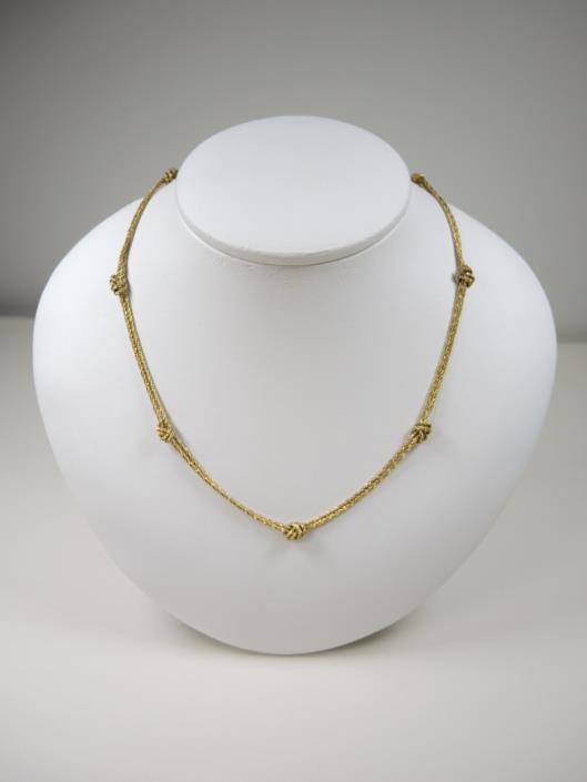 TIFFANY & CO 18K Yellow Gold Knotted Necklace Retailed for $2500, sold in one day for $1300.