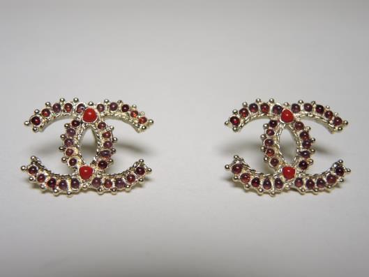 CHANEL 2014 Red and Purple CC Earrings Sold in one day for $279. 07/08/17 Complete the set with these earrings in the same color pattern.