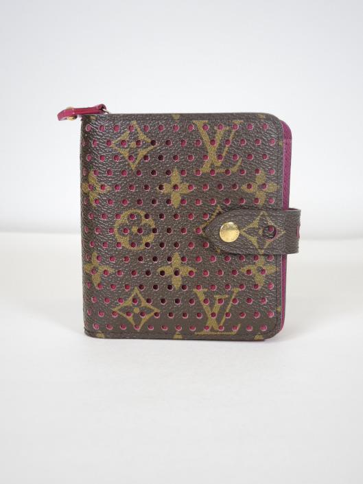 LOUIS VUITTON Limited Edition Perforated Compact Zip Wallet Sold in one day for $399.